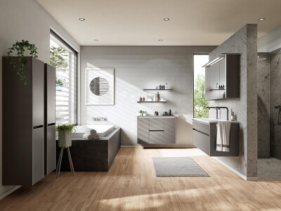 Stimmiges Bild, dass zum Entspannen einlädt. Die Schrankelemente in der ARTIS 937 Glasoptik fügen sich in der Farbe Titanio mit leichtem metallischem Schimmer ideal in das Bad ein und geben ihm einen zeitlosen Stil.